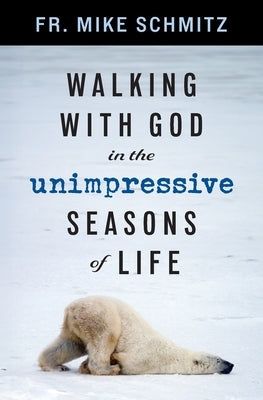 Paperback copy of "Walking with God in the Unimpressive Seasons of Life" by Word Among Us Press, featuring a book cover with serene design.