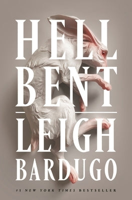 Paperback of Hell Bent by Flatiron Books, featuring the book cover with dark, mysterious artwork and bold title text.