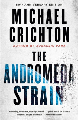 Vintage paperback of The Andromeda Strain featuring the book cover with science-themed illustrations and title text.