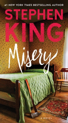 Mass market paperback of "Misery" by Pocket Books showing the book cover with dark and intense artwork.