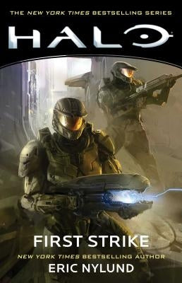 Paperback of Halo: First Strike by Gallery Books featuring cover art with space-themed imagery and the title prominently displayed.