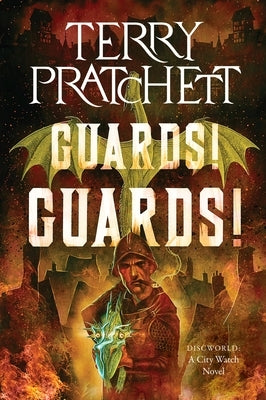 Paperback of "Guards! Guards!: A Discworld Novel" by Harper Paperbacks, featuring the book cover with colorful artwork.
