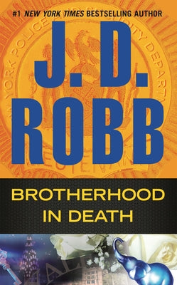 Mass market paperback of Brotherhood in Death by Berkley Books, featuring a dark, dramatic cover with urban crime scene imagery.