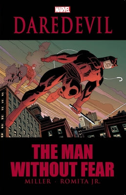 Marvel Universe Daredevil: The Man Without Fear paperback book with cover art featuring Daredevil in a dynamic pose.