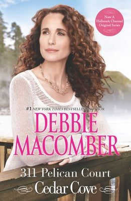 Paperback book titled "311 Pelican Court" by Mira Books, showing the front cover with title and author details.