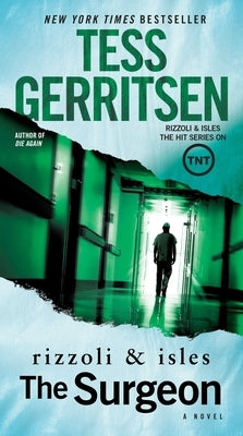 Mass market paperback of "The Surgeon" by Rizzoli & Isles novel, published by Ballantine Books, showing the book cover with title and author.