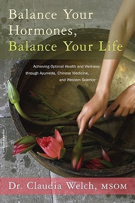 Paperback book titled "Balance Your Hormones, Balance Your Life" by Balance, featuring a cover with herbal and medical illustrations.