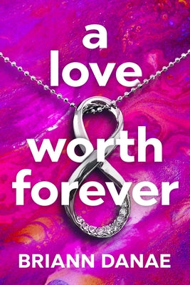 Paperback copy of "A Love Worth Forever" by Black Odyssey Media, featuring the book cover with title and author details.