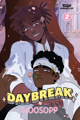 Paperback of Daybreak Volume 2 Webtoon Unscrolled graphic novel featuring a colorful cover with illustrated characters.