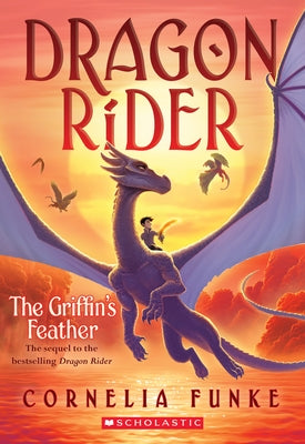Paperback of The Griffin's Feather, volume 2 in the Dragon Rider series by Chicken House, showing the book cover with fantasy artwork.