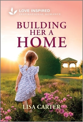 Mass market paperbound of "Building Her a Home" by Love Inspired, featuring a romantic cover with a cozy home scene.