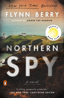 Paperback of Northern Spy novel by Reese's Book Club, published by Penguin Publishing Group, featuring a colorful cover design.