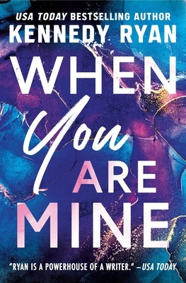 Paperback copy of "When You Are Mine" by Forever featuring the book cover with romantic artwork and title text.