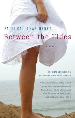 Paperback of "Between the Tides" by Penguin Publishing Group, featuring a dark blue cover with ocean-themed artwork.