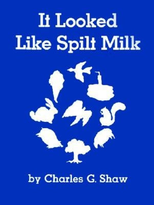 Paperback copy of "It Looked Like Spilt Milk" by HarperCollins, featuring the book cover with colorful artwork and title text.