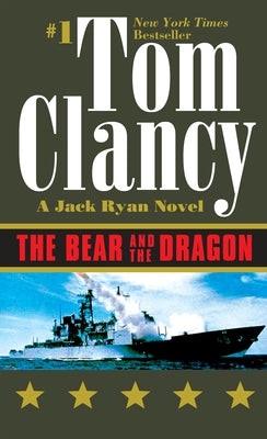 Mass market paperback of "The Bear and the Dragon" by Berkley Books, showing the book cover with title and author text.