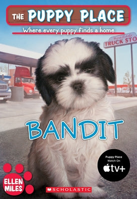 Paperback book cover of "The Puppy Place #24: Bandit" by Scholastic Paperbacks featuring an illustration of a playful puppy.