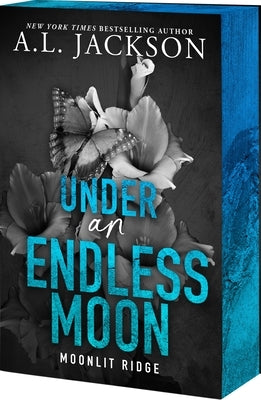 Paperback of "Under an Endless Moon" by Entangled: Amara, showing the book cover with moon imagery and celestial design.