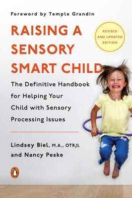 Paperback book titled "Raising a Sensory Smart Child" by Penguin Books, showing the cover with colorful sensory-themed illustrations.