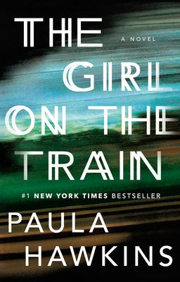 Paperback of The Girl on the Train novel by Riverhead Books with a dark, moody cover featuring a blurred train window scene.