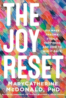 Paperback book titled "The Joy Reset" by Balance, featuring a cover with calming colors and a person meditating.