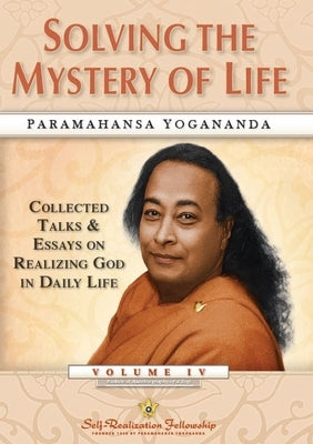 Paperback book titled "Solving the Mystery of Life" by Self-Realization Fellowship, featuring collected talks and essays on realizing God.