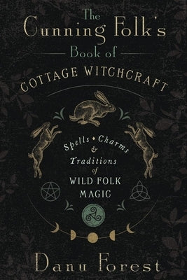 Paperback book titled "The Cunning Folk's Book of Cottage Witchcraft" by Llewellyn Publications, featuring spells, charms, and folk magic.