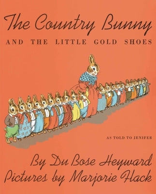 Paperback edition of The Country Bunny and the Little Gold Shoes by Clarion Books, showing the book cover with colorful illustrations.