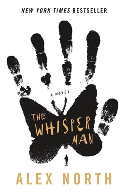 Paperback copy of "The Whisper Man" novel by Celadon Books showing the front cover with dark, eerie artwork.
