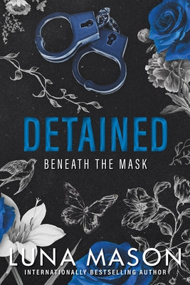 Paperback of "Detained: A Dark Mafia Romance" by Kensington Publishing, featuring dark, moody cover art with mysterious imagery.