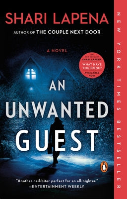 Paperback copy of "An Unwanted Guest" by Penguin Books, featuring the book cover with dark and mysterious design.