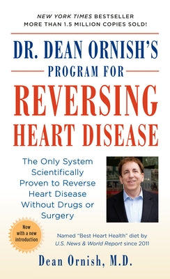 Mass market paperbound book titled "Dr. Dean Ornish's Program for Reversing Heart Disease" by Ivy Books, featuring a cover with heart health imagery.