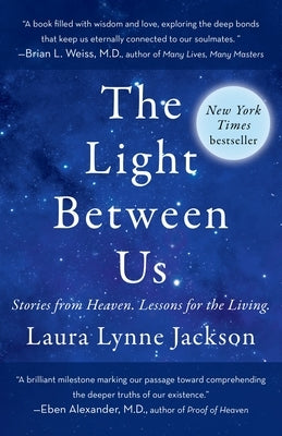 Paperback of "The Light Between Us" by Dial Press, featuring a cover with celestial and serene imagery.