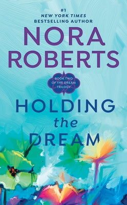 Holding the Dream mass market paperbound book by Berkley Books, featuring a colorful cover with an illustration.