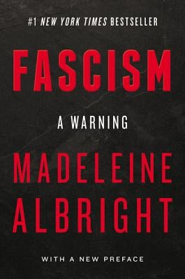 Paperback copy of "Fascism: A Warning" by Harper Perennial, featuring the book cover with title and author details.