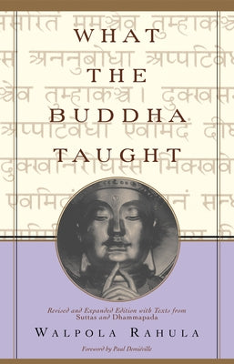 Paperback copy of "What the Buddha Taught" by Grove Press, showing the book cover with text and design elements.