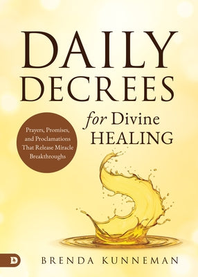 Paperback book titled "Daily Decrees for Divine Healing" by Destiny Image, featuring spiritual prayers and proclamations for miracles.