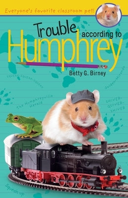 Paperback edition of "Trouble According to Humphrey" by Penguin Young Readers Group, featuring the book cover with colorful illustrations.