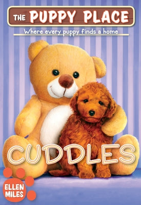 Paperback copy of "Cuddles" from The Puppy Place series by Scholastic Paperbacks, featuring a cute puppy on the cover.