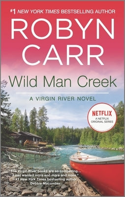 Wild Man Creek mass market paperback book by Mira Books featuring a scenic cover with mountains and a river scene.