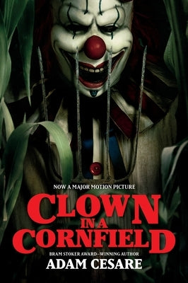 Paperback edition of Clown in a Cornfield movie tie-in by HarperCollins, featuring a spooky clown on the cover image.