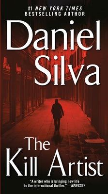 Mass market paperback of The Kill Artist by Berkley Books featuring a dark cover with a mysterious figure and cityscape background.
