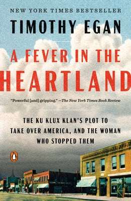 Paperback of "A Fever in the Heartland" by Penguin Books, showing the book cover with title and author details.
