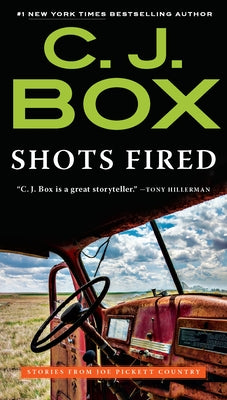 Mass market paperbound of "Shots Fired: Stories from Joe Pickett Country" by G.P. Putnam's Sons, showing the book cover.