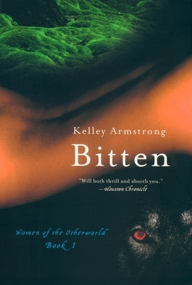Paperback of "Bitten" by Plume Books, showing the book cover with title and author text on a plain background.