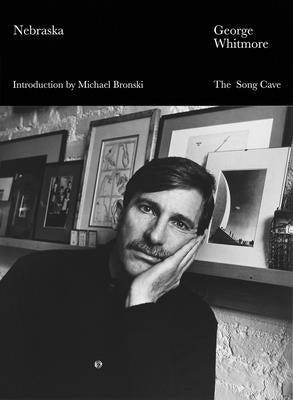 Paperback of Nebraska by Song Cave, featuring the book's cover with title and author details in a clear, close-up view.