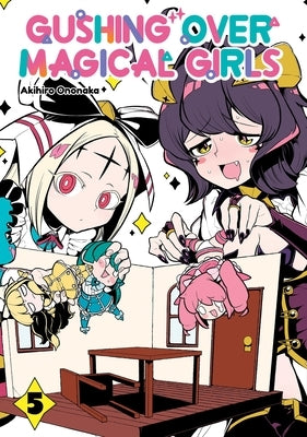 Paperback manga titled Gushing Over Magical Girls: Volume 5 by Jnc, featuring colorful illustrated cover art of magical girls.