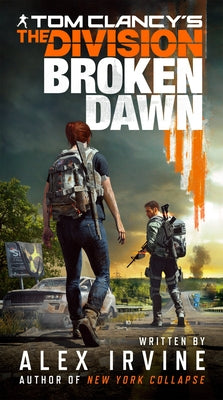 Mass market paperback of Tom Clancy's The Division: Broken Dawn book, featuring cover art with dark cityscape and tactical imagery.