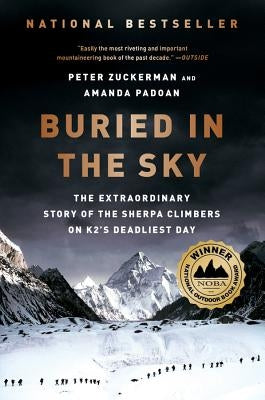 Paperback book titled "Buried in the Sky" by W. W. Norton & Company, featuring a mountain climbing scene on the cover.