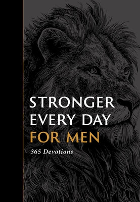 Paperback copy of "Stronger Every Day for Men: 365 Devotions" by Tyndale Momentum, featuring an open book with devotional pages.